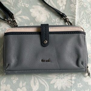 The Sak blue leather crossbody wallet.